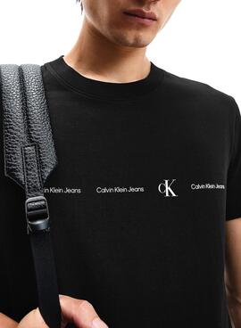 T-Shirt Logo Calvin Klein ripetuto Nero Uomo