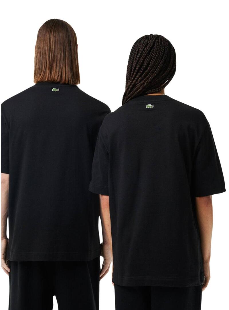 Maglietta Lacoste Unisex Loose Fit nera con logo coccodrillo.