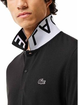 Polo Lacoste Movement con collo jacquard nero da uomo