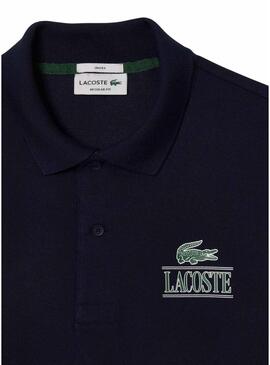 Maglietta polo Lacoste unisex in piqué stampato 3D bianca.