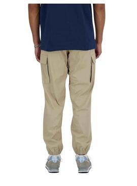 Pantaloni New Balance Twill Beige per Uomo