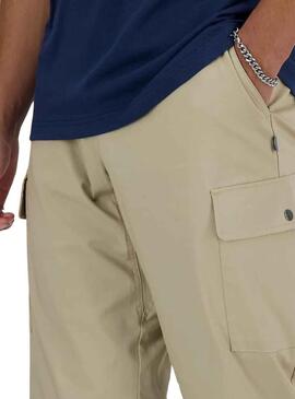 Pantaloni New Balance Twill Beige per Uomo