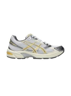 Scarpe Asics Gel 1130 gialle e argento per donna.