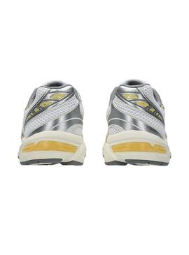 Scarpe Asics Gel 1130 gialle e argento per donna.