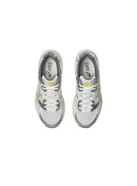 Scarpe Asics Gel 1130 gialle e argento per donna.