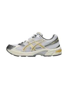 Scarpe Asics Gel 1130 gialle e argento per donna.