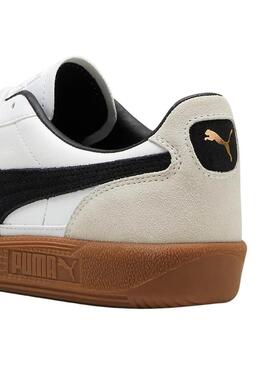 Scarpe Puma Palermo bianche e nere per donna e uomo.