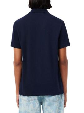 Polo Lacoste a coste blu scuro per uomo.