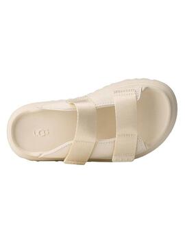 Sandali UGG GoldenGlow Slide beige per bambina e bambino.