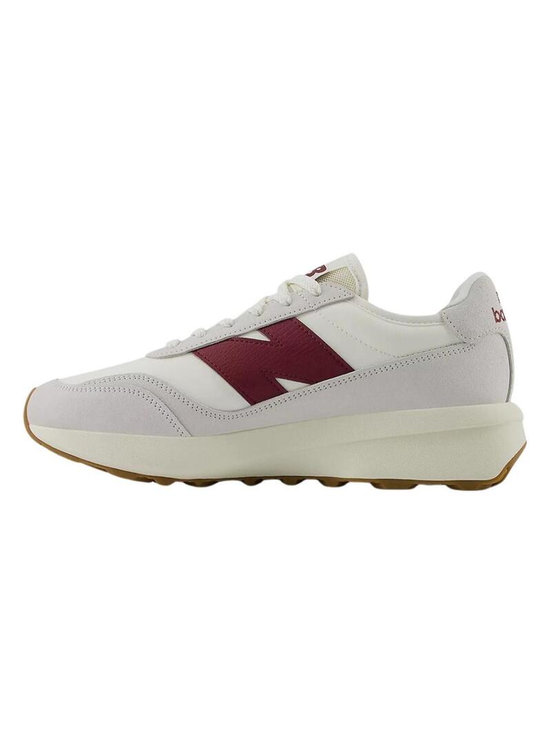 Sneakers New Balance U370 bianche e granate per donna e uomo.
