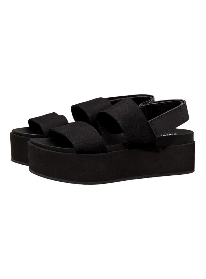 Sandali Calvin Klein con plateau neri per donna.