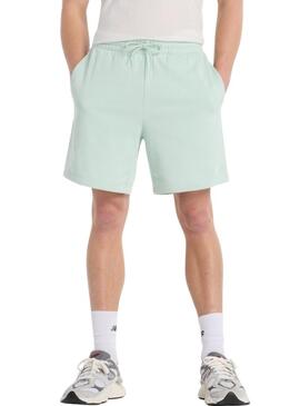 Bermuda New Balance Sport Essentials verde per uomo.