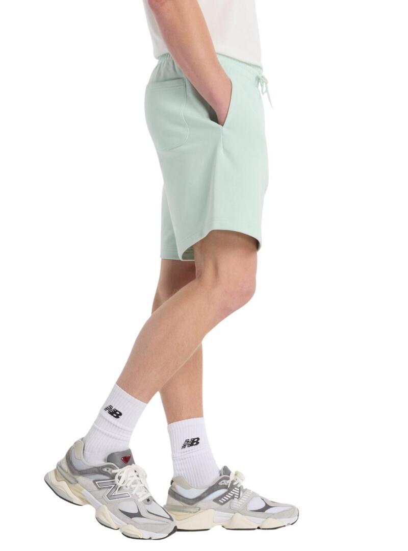 Bermuda New Balance Sport Essentials verde per uomo.