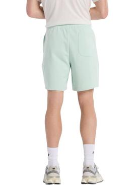 Bermuda New Balance Sport Essentials verde per uomo.