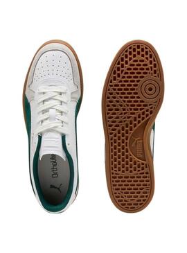 Scarpe da ginnastica Puma Indoor bianche e verdi per uomo.
