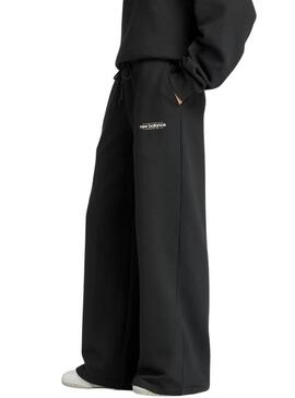Pantaloni New Balance Reimagined neri per donna
