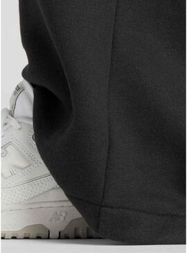 Pantaloni New Balance Reimagined neri per donna