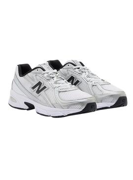 Scarpe New Balance U740 bianche e nere per donna.