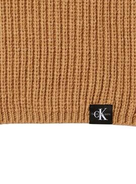Cappello e sciarpa Calvin Klein color cammello per bambini.