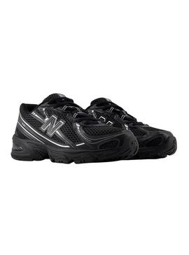 Scarpe New Balance 740 nere per bambini.