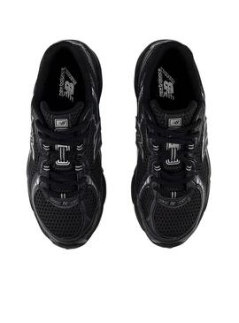 Scarpe New Balance 740 nere per bambini.
