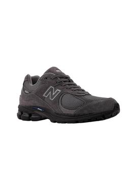 Sneakers New Balance U2002R viola e nere per uomo