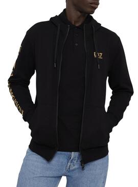 Giubbotto Emporio Armani EA7 nero e dorato con cappuccio per uomo.