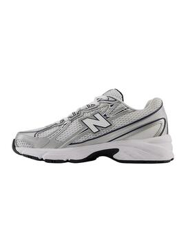 Sneakers New Balance U740 bianche e blu marino per donna.