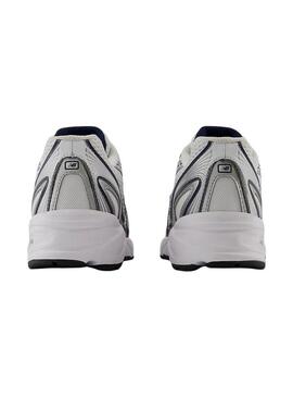 Sneakers New Balance U740 bianche e blu marino per donna.