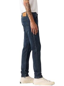Pantaloni slim fit Levis Taper 512 in denim scuro per uomo.