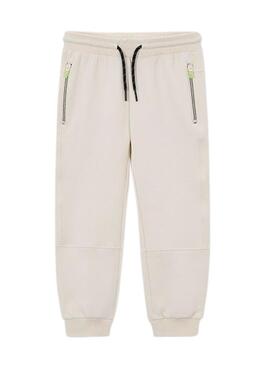 Pantaloni Mayoral bianchi tipo tuta per bambino.