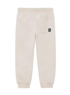 Pantaloni Mayoral bianchi tipo tuta per bambino.