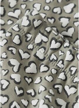 Pantaloni a zampa Name It stampati con cuori verdi per ragazza.