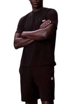 Bermuda Calvin Klein Jeans Badge nero per uomo.