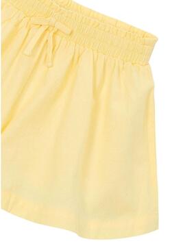Gonna pantalone fluida gialla di Mayoral per bambina.